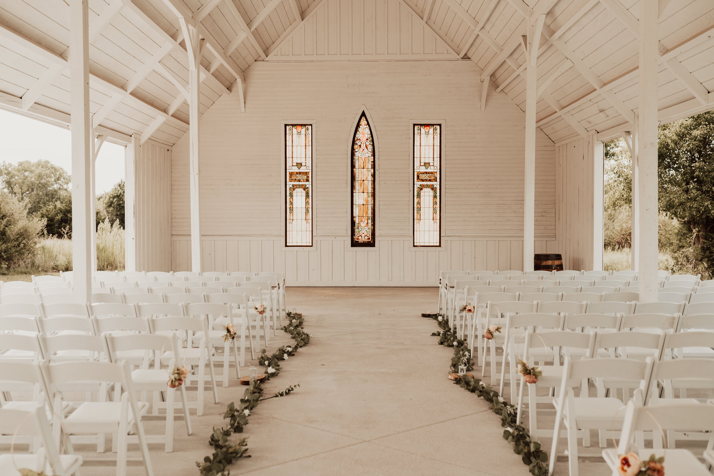 Hayley + Lorenzo - Summer White Chapel Wedding at Stone Hill Barn in Augusta, Kansas140.jpg
