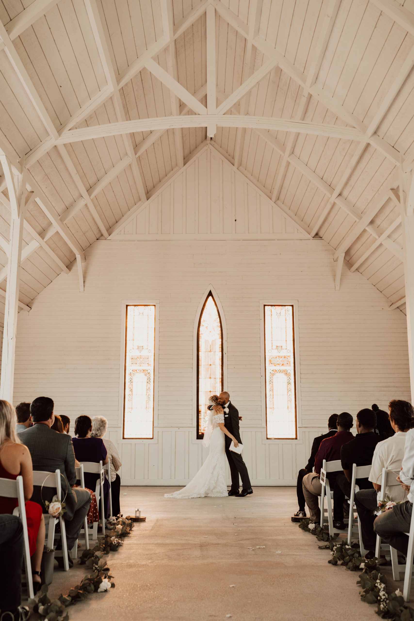 Hayley + Lorenzo - Summer White Chapel Wedding at Stone Hill Barn in Augusta, Kansas153.jpg