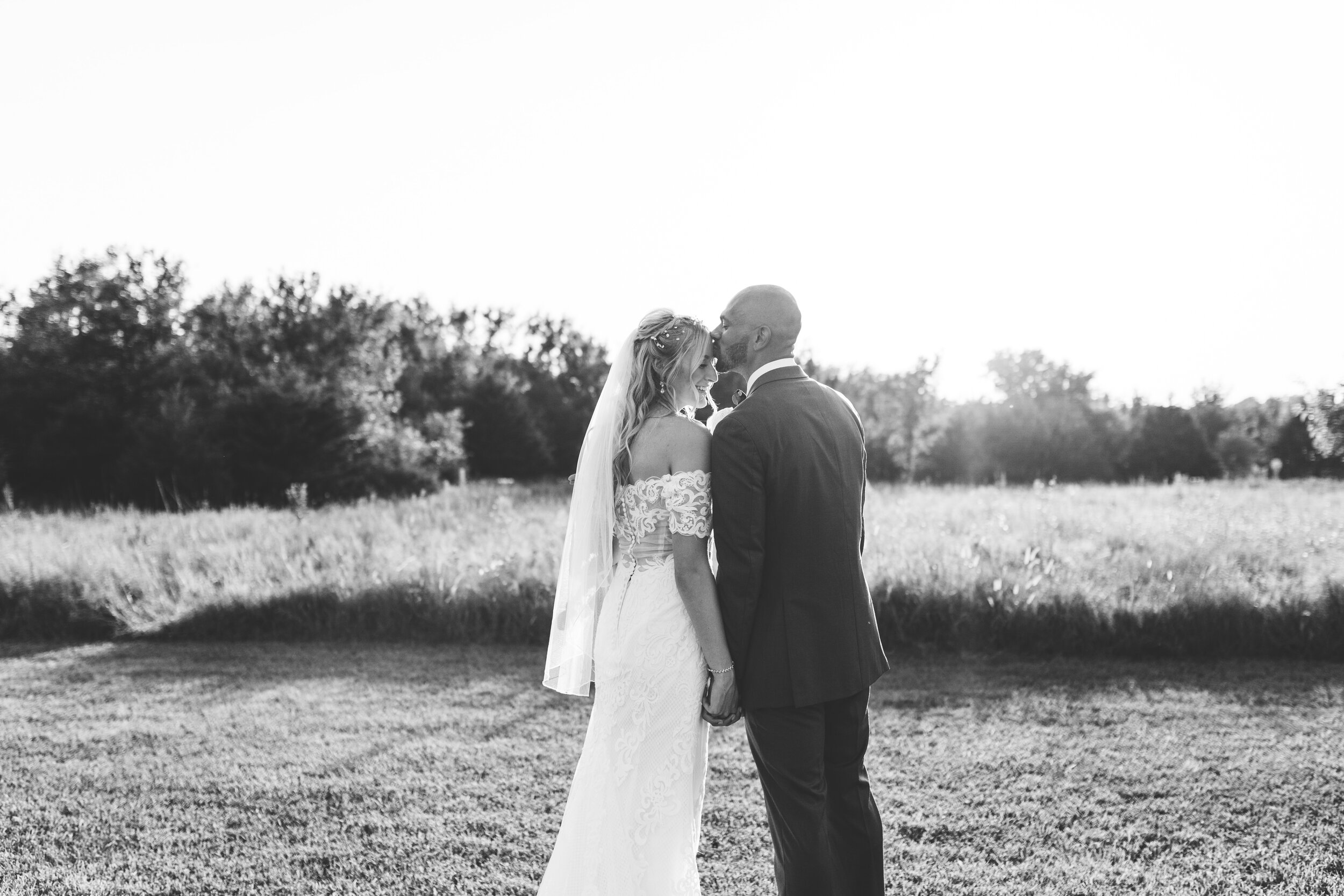 Hayley + Lorenzo - Summer White Chapel Wedding at Stone Hill Barn in Augusta, Kansas177.jpg