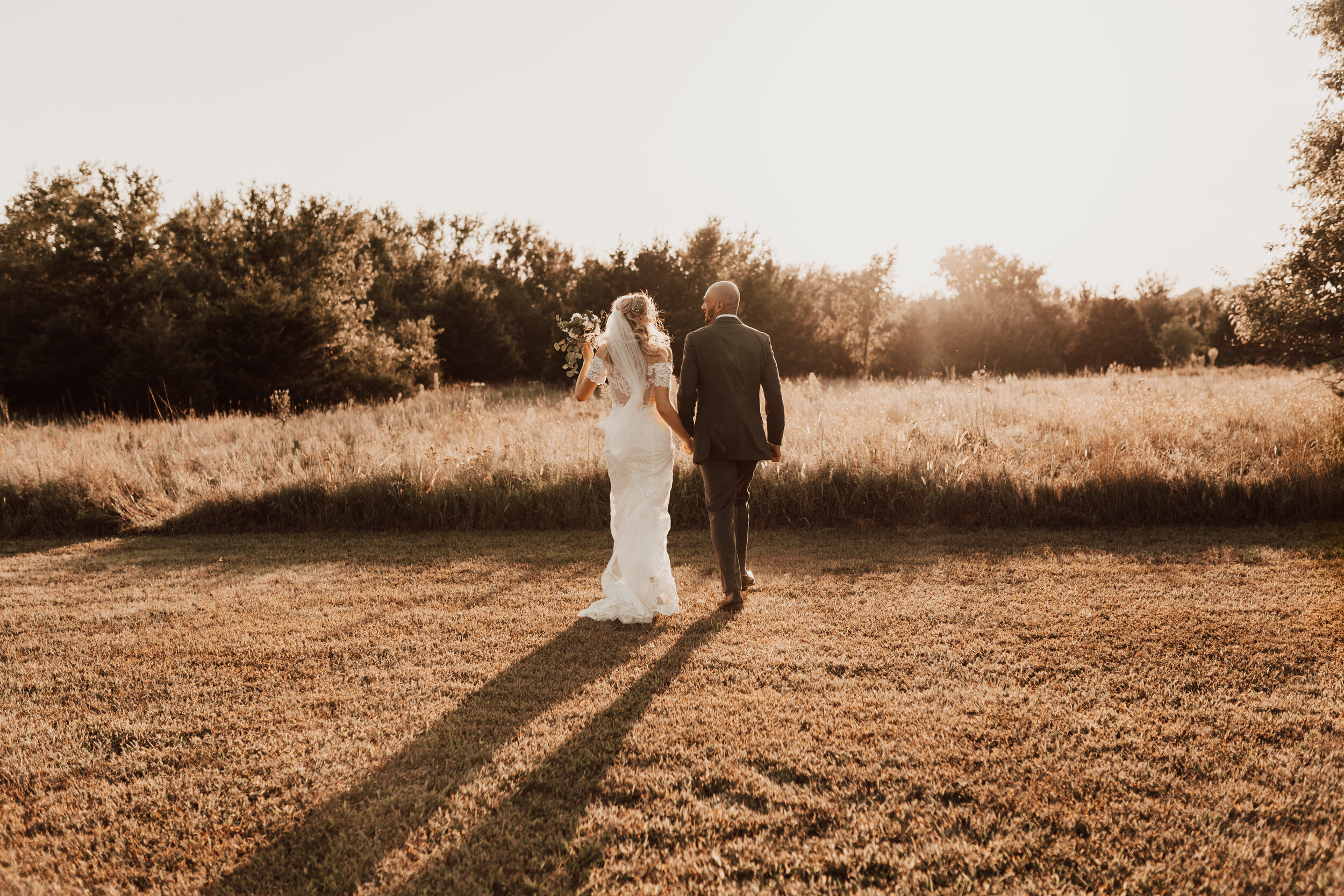 Hayley + Lorenzo - Summer White Chapel Wedding at Stone Hill Barn in Augusta, Kansas178.jpg
