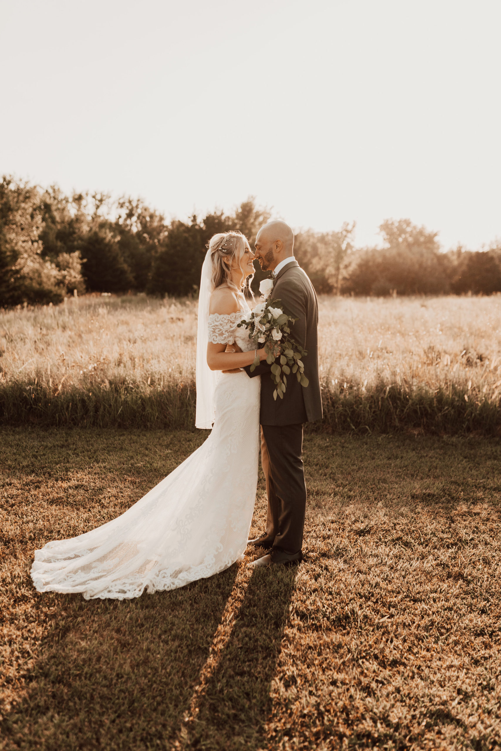 Hayley + Lorenzo - Summer White Chapel Wedding at Stone Hill Barn in Augusta, Kansas180.jpg