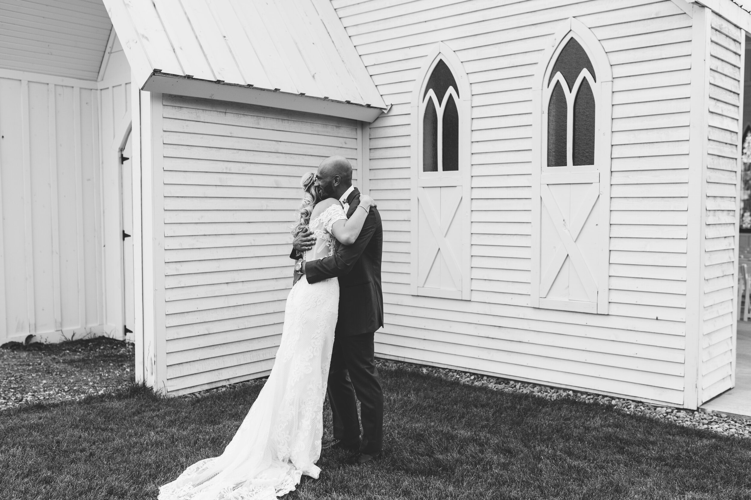 Hayley + Lorenzo - Summer White Chapel Wedding at Stone Hill Barn in Augusta, Kansas76.jpg