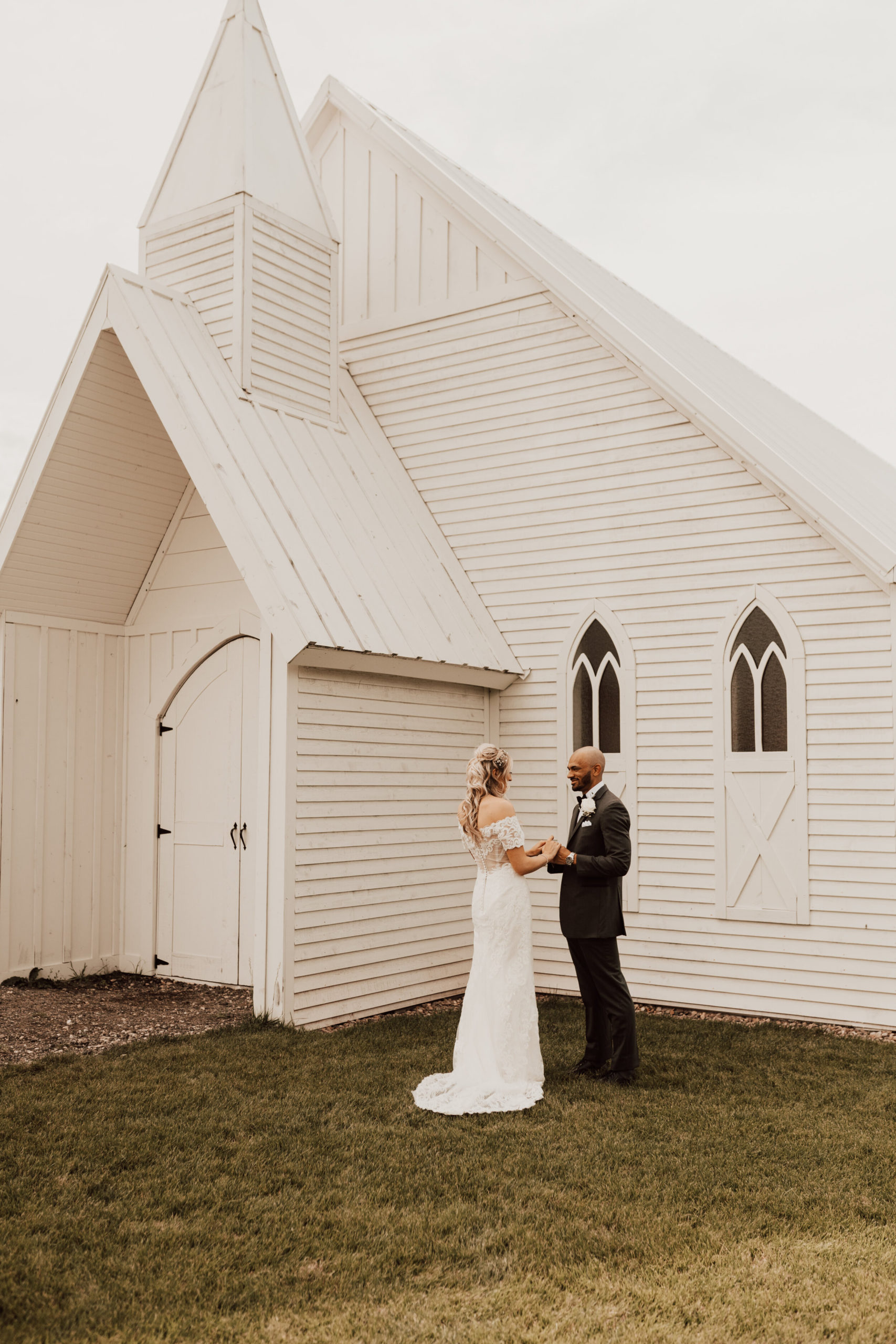 Hayley + Lorenzo - Summer White Chapel Wedding at Stone Hill Barn in Augusta, Kansas79.jpg