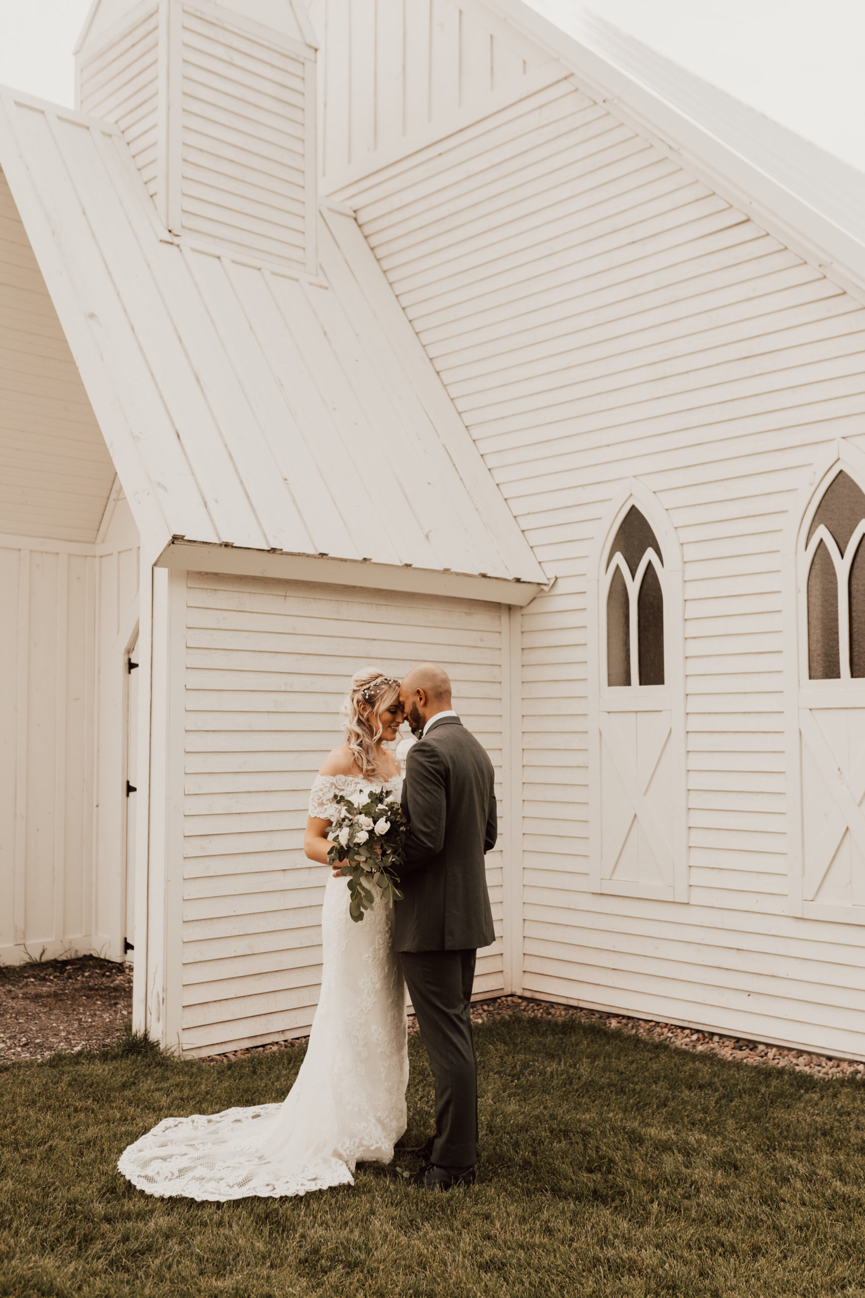 Hayley + Lorenzo - Summer White Chapel Wedding at Stone Hill Barn in Augusta, Kansas81.jpg