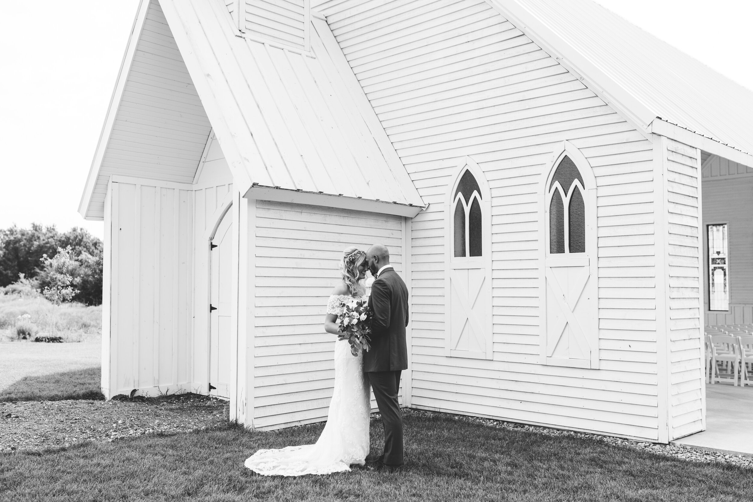 Hayley + Lorenzo - Summer White Chapel Wedding at Stone Hill Barn in Augusta, Kansas82.jpg