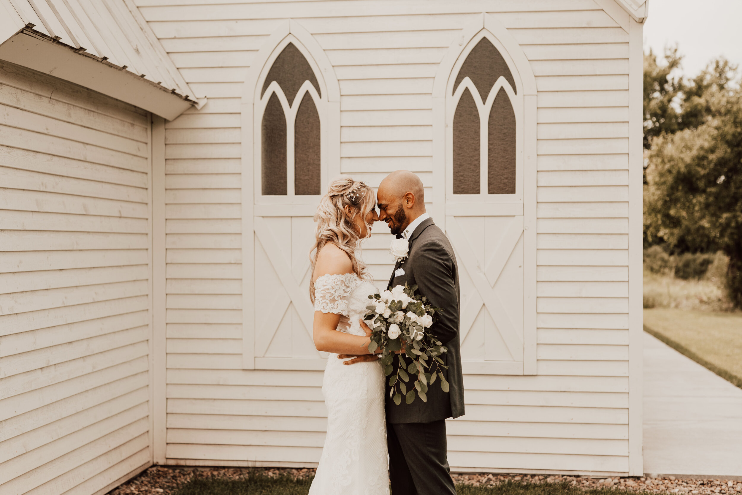 Hayley + Lorenzo - Summer White Chapel Wedding at Stone Hill Barn in Augusta, Kansas83.jpg