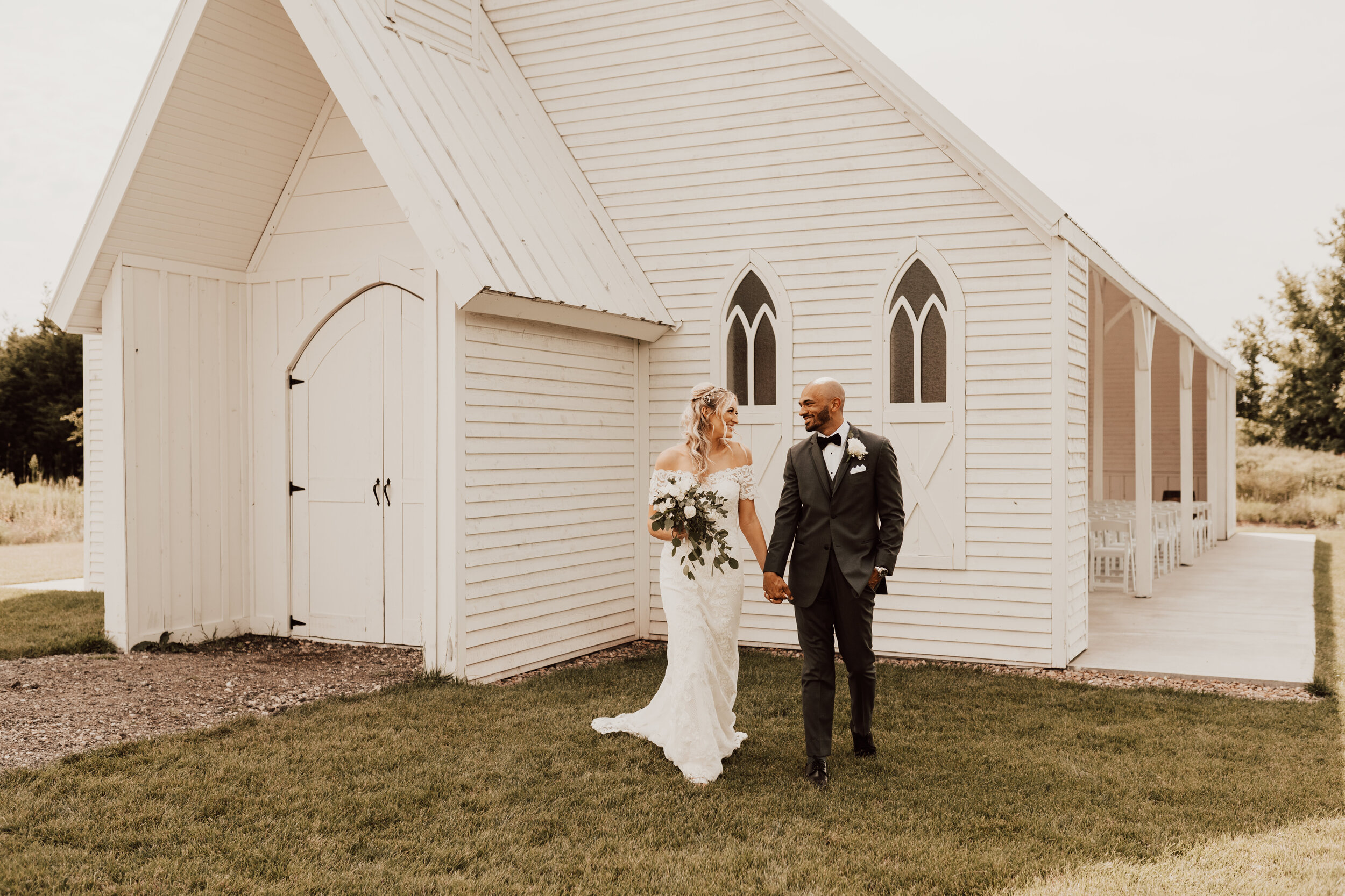 Hayley + Lorenzo - Summer White Chapel Wedding at Stone Hill Barn in Augusta, Kansas84.jpg
