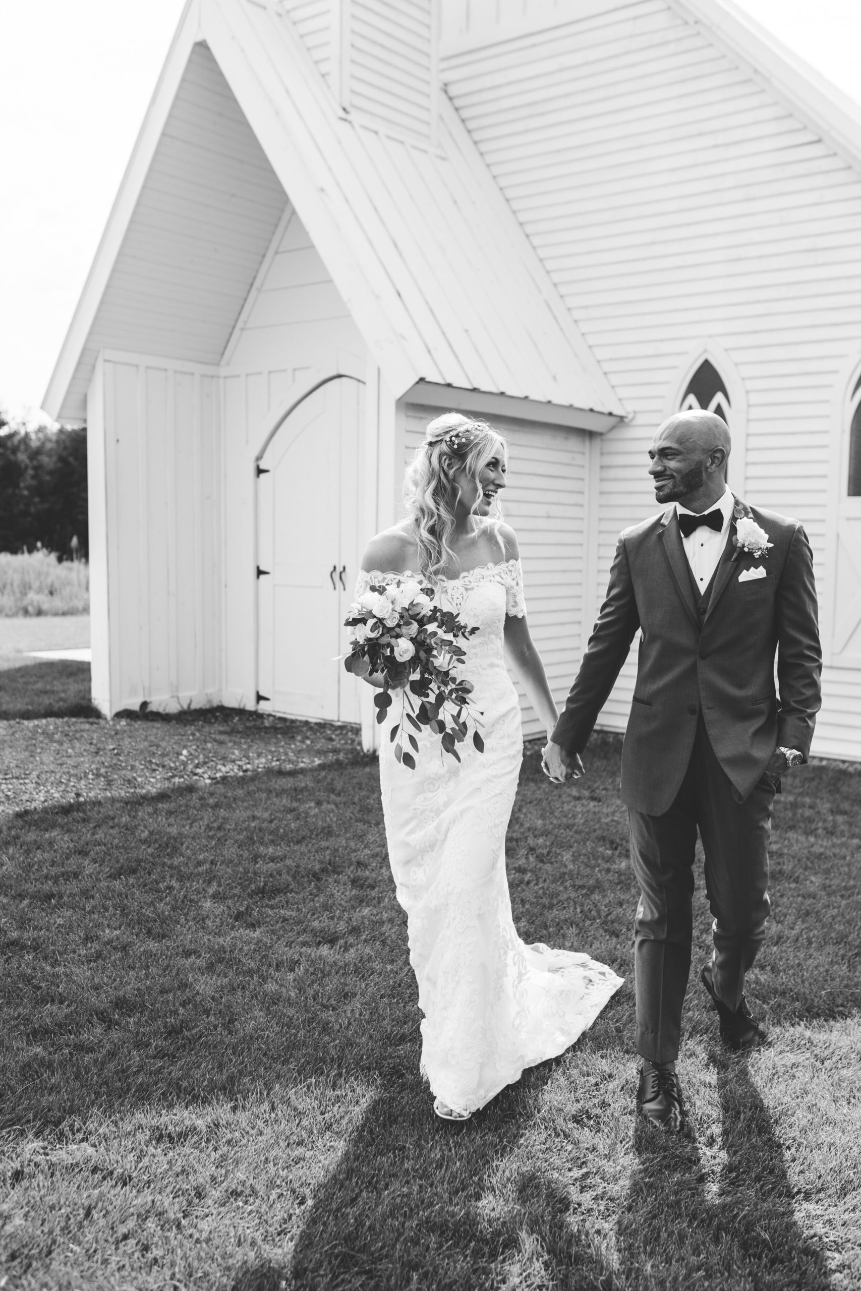 Hayley + Lorenzo - Summer White Chapel Wedding at Stone Hill Barn in Augusta, Kansas85.jpg