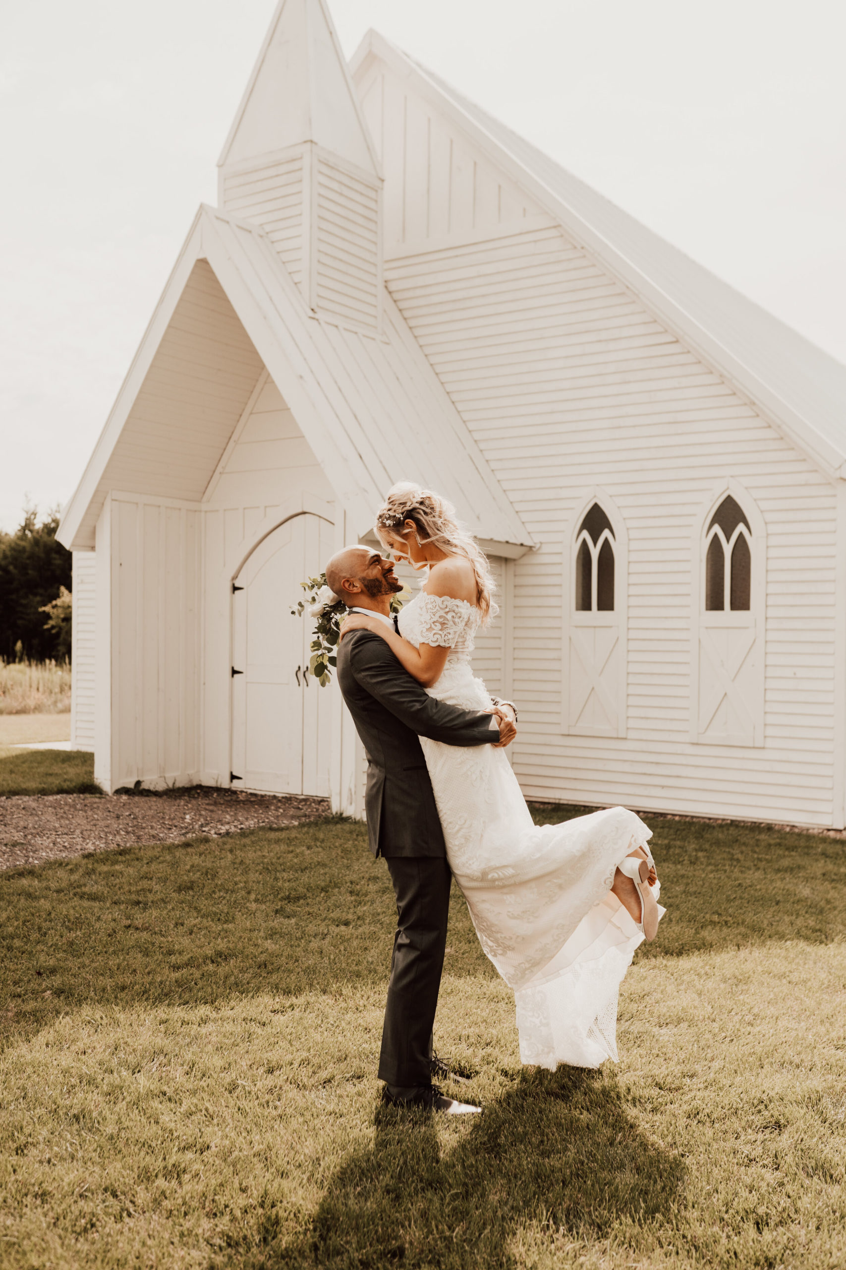 Hayley + Lorenzo - Summer White Chapel Wedding at Stone Hill Barn in Augusta, Kansas87.jpg