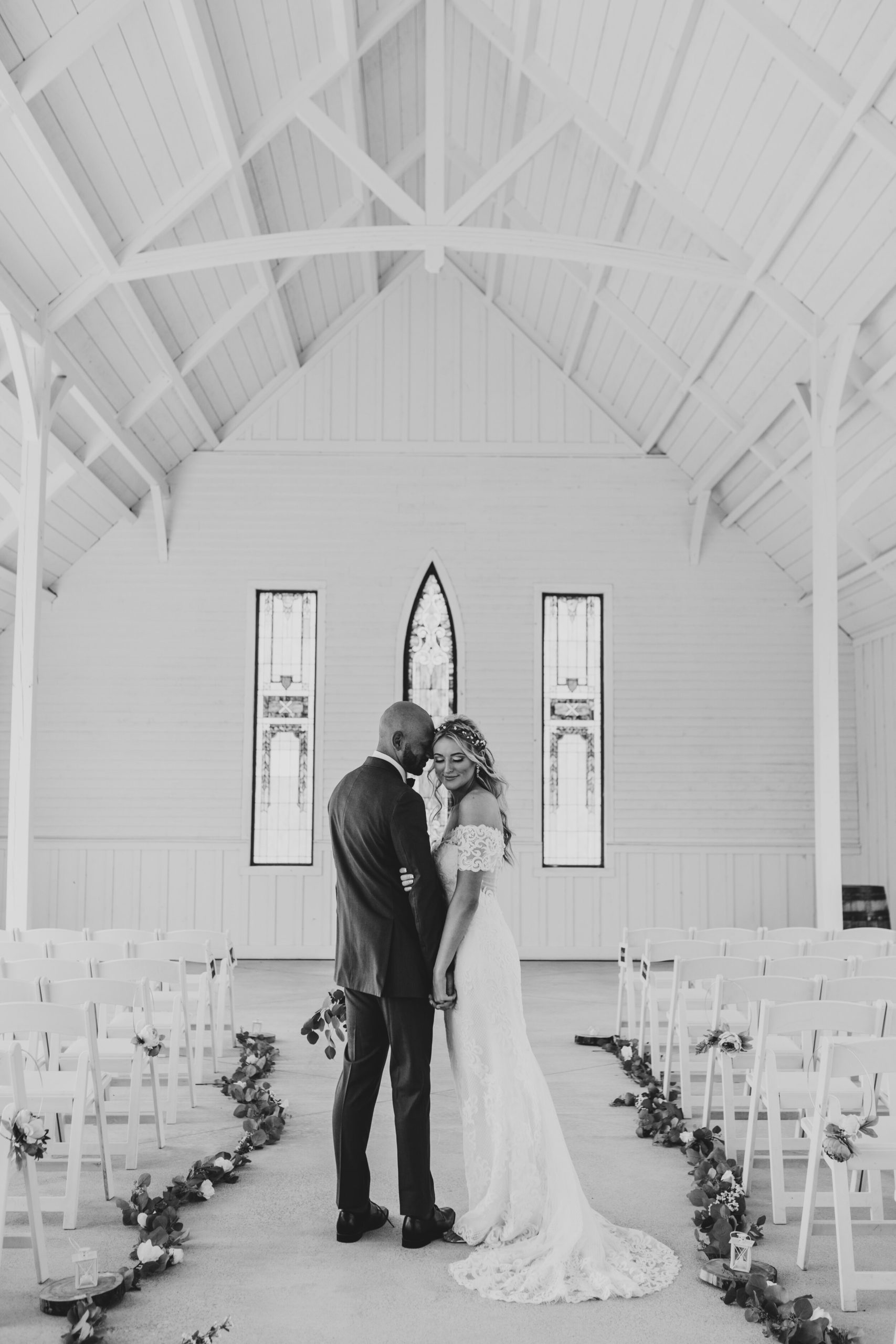 Hayley + Lorenzo - Summer White Chapel Wedding at Stone Hill Barn in Augusta, Kansas93.jpg